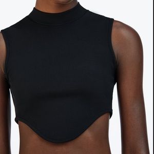 NWT. Top with Back Opening